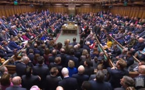 A video grab from footage broadcast by the UK Parliament's Parliamentary Recording Unit (PRU) shows MP's waiting for the result of the second meaningful vote on the government's Brexit deal, in the House of Commons in London on March 12, 2019.
