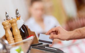 Credit card transaction in a restaurant.