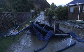 This photo - captioned "found the tramp" - shows a wrecked trampoline after reports of a tornado near Hokitika.
