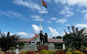 This photo taken on June 22, 2023 shows a general view Vanuatu's parliament in Port Vila. Arab oil states are using their vast wealth to build influence across the far-flung South Pacific, experts have told AFP, tearing a page straight out of China's "Belt and Road" playbook. One of the most conspicuous examples sits smack in the middle of Vanuatu's leafy capital Port Vila, where a UAE-funded solar farm keeps the lights on inside the country's parliament. (Photo by Ben BOHANE / AFP) / TO GO WITH AFP STORY: Vanuatu-Pacific-climate-environment-diplomacy, FOCUS by Steven TRASK