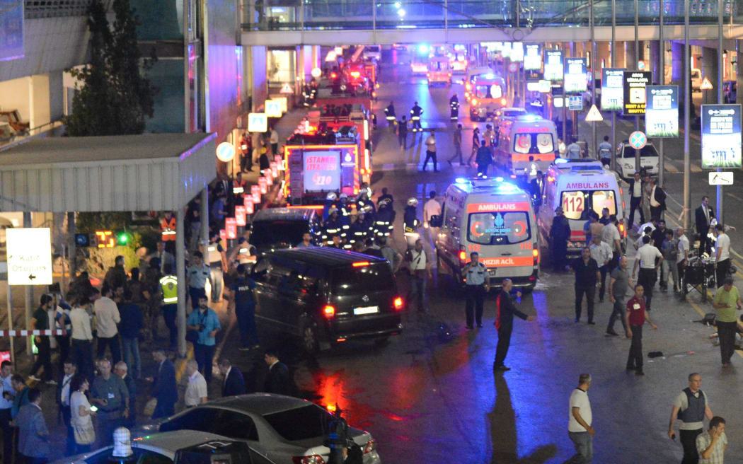 Ambulances and police at the entrance to Ataturk Airport after the explosion.