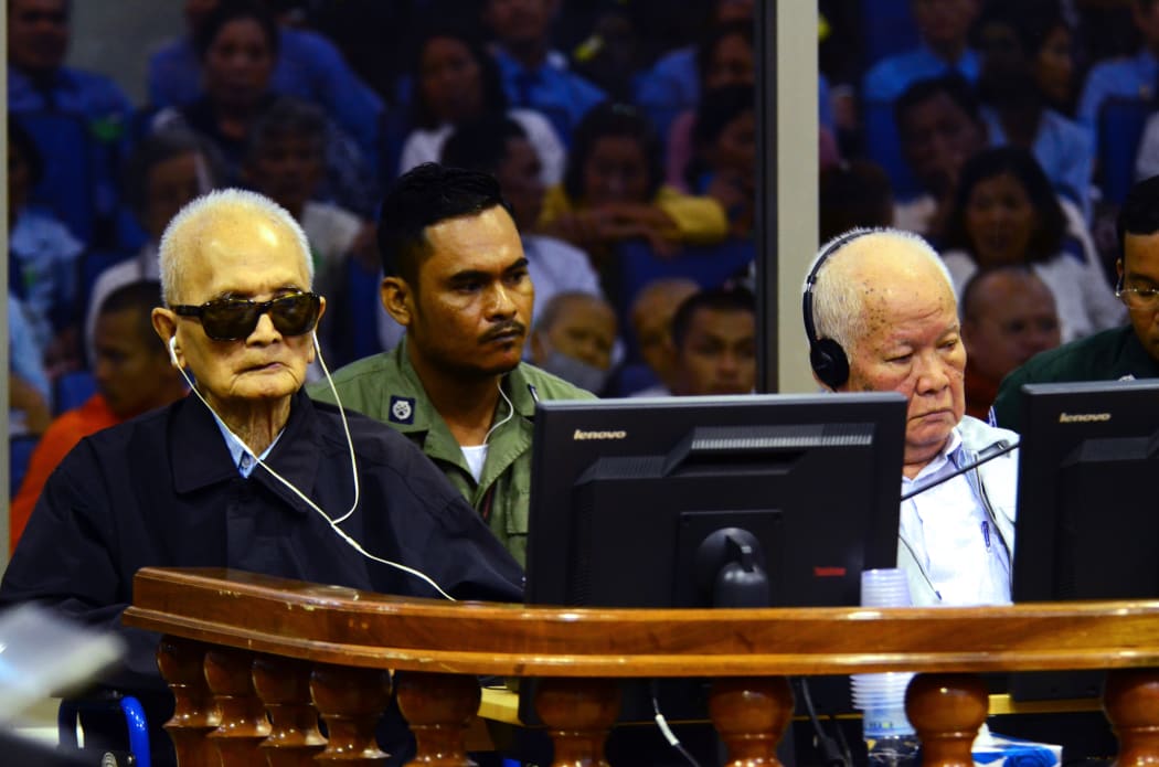 Former Khmer Rouge leader "Brother Number Two" Nuon Chea (L) and former Khmer Rouge head of state Khieu Samphan (R) sitting in the courtroom at the ECCC in Phnom Penh.