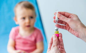 18 month-old boy, MMR vaccination.