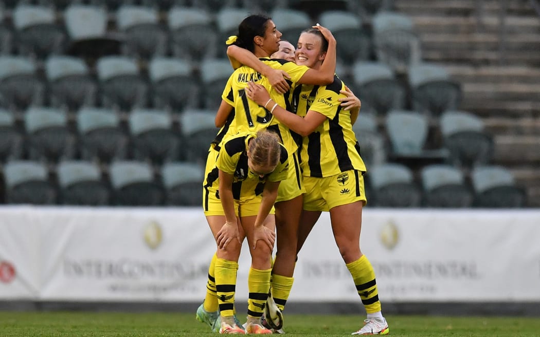 Phoenix players celebrate after their draw against the Wanderers during their A-League Women’s match 2021.