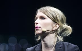 Former US soldier Chelsea Manning speaks during the C2 conference in Montreal, Quebec, on May 24, 2018. / AFP PHOTO / Lars Hagberg