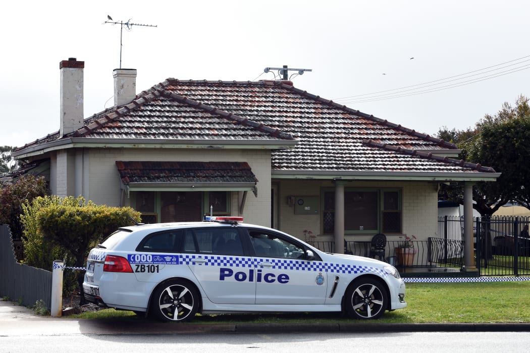 A police car is seen outside a house from where police recovered five dead bodies in the suburb of Australia's western city of Perth on September 10, 2018.
