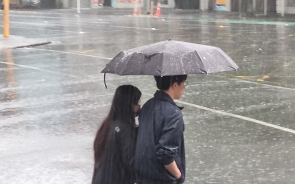 Heavy rain falling in Auckland city.