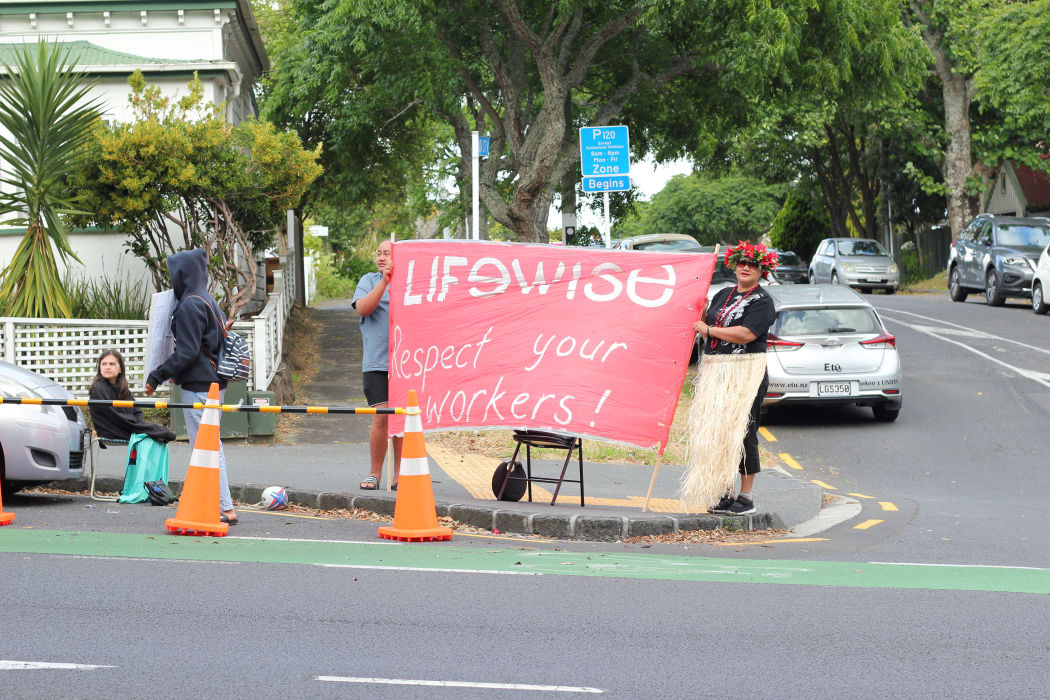 "Lifewise - respect your workers" banner at the strike in Auckland