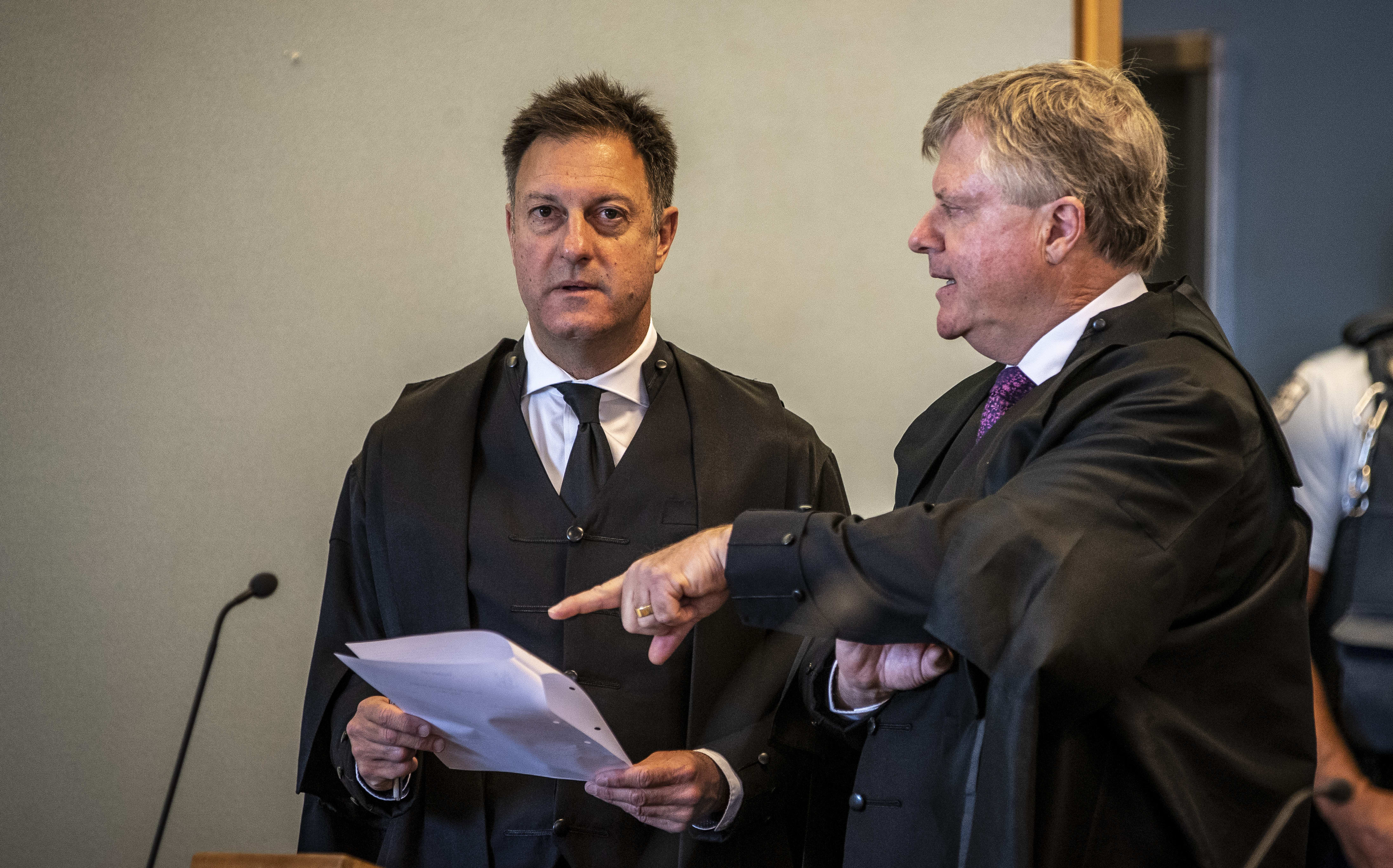Crown Prosecutor Simon Foote QC (left) and Defence lawyer David Jones QC.