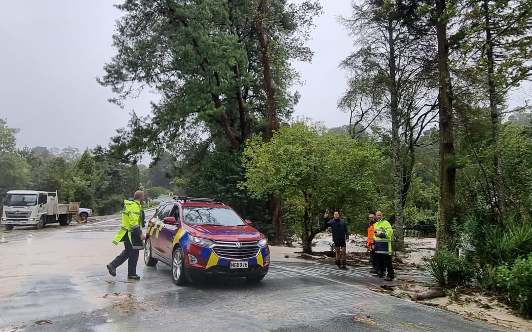 Police at a flooded property on Whareora Road in Whangārei during Cyclone Gabrielle. 14/2/23