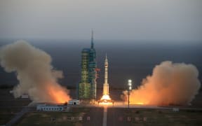 The Long March-2F carrier rocket carrying China's Shenzhou-11 manned spacecraft blasts off from the launch pad at the Jiuquan Satellite Launch Centre.