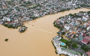 An aerial picture shows Hue city, submerged in floodwaters caused by heavy downpours, in central Vietnam on October 12, 2020.