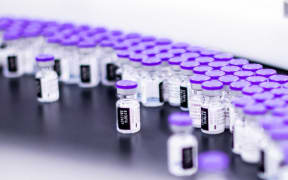 Vials of the Pfizer-BioNTech Covid-19 vaccine are prepared for packaging at the company’s facility in Puurs, Belgium.