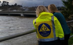 Civil Defence Minister Nikki Kaye and Whanganui Mayor Annette Main by the still very swollen Whanganui River.