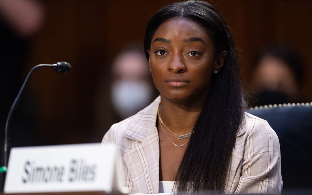 US Olympic gymnasts Simone Biles testifies during a Senate Judiciary hearing about the Inspector General's report on the FBI handling of the Larry Nassar investigation of sexual abuse of Olympic gymnasts, on Capitol Hill, September 15, 2021, in Washington, DC. (Photo by SAUL LOEB / POOL / AFP)