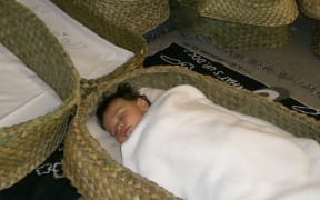 A baby in a wahukura (file photograph).
