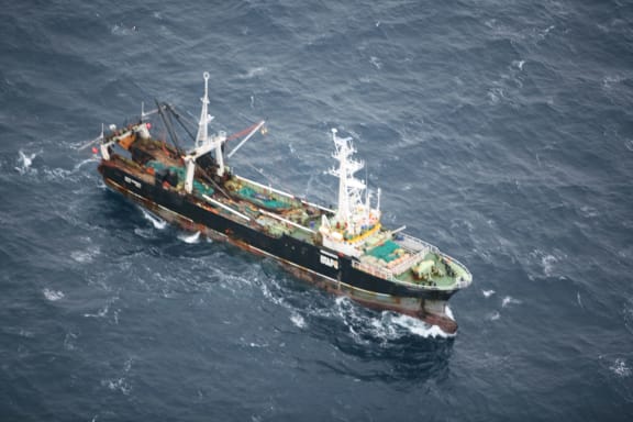 The trawler hit rocks and ruptured a fuel tank.