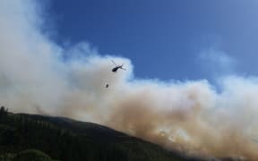 Nine helicopters were fighting the forest fire in the Waikakaho Valley by air on Wednesday.