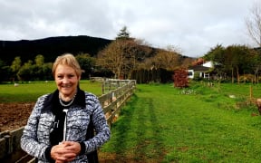Jane Wood on her land in Manakau. She's one of many residents sick of waiting to hear whether the road will go ahead, and when.