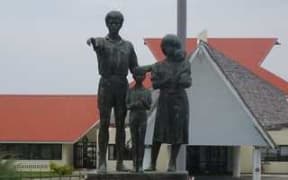 A statue outside the Vanuatu parliament.
