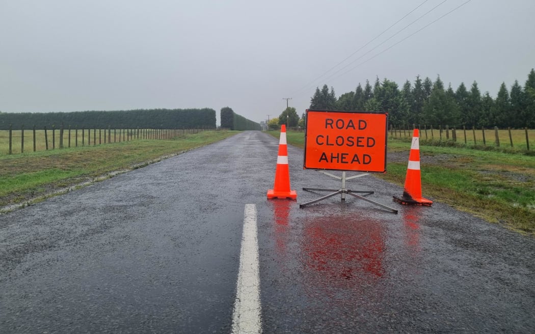 Road closure sign in the Central Hawke's Bay District village of Ongaonga after heavy rain caused damage and flooding on roads.