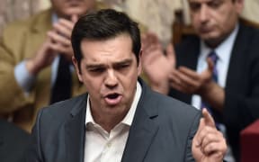Greek Prime Minister Alexis Tsipras addresses parliament ahead of the vote on the austerity package.