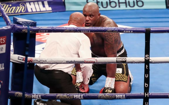 Dillian Whyte is given the count by the referee in the dying stages of his fight against Joseph Parker.