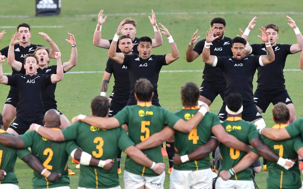 The All Blacks are seen performing the Haka during the Rugby Championship Round 5 match between New Zealand All Blacks and South Africa Springboks at Queensland Country Bank Stadium in Townsville