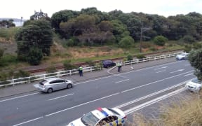 The car which came off the road onto the railway tracks.