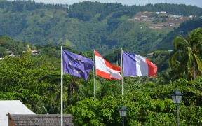 220414. Photo RNZ. French Polynesia. Flags at territorial assembly in French Polynesia