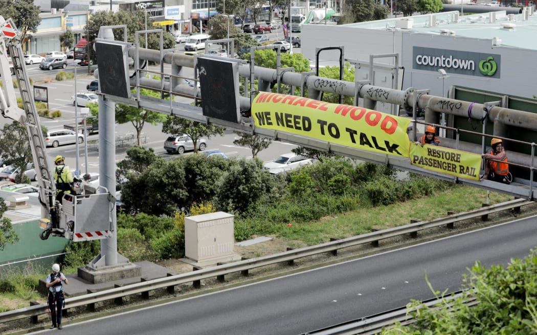 Restored passenger rail gantry protest in Wellington