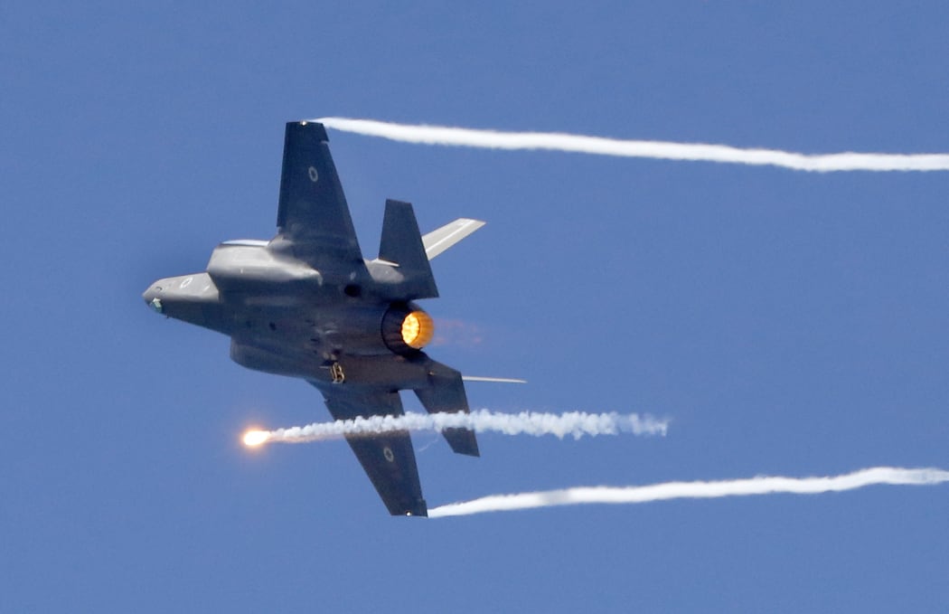 An Israeli F-35 fighter jets performs during an air show, over Tel Aviv, on May 9, 2019.