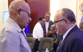 Bougainville president John Momis and PNG prime minister Peter O'Neill.