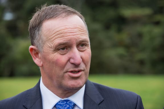 John Key at a stand up with media. 8 July 2016.