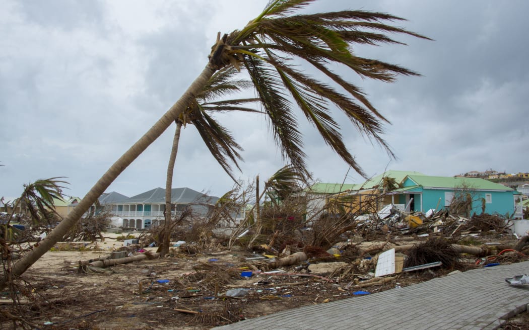 Destroyed trees and houses are seen after the passage of hurricane Irma and Maria in Orient Bay, St. Martin, on September 20, 2017.