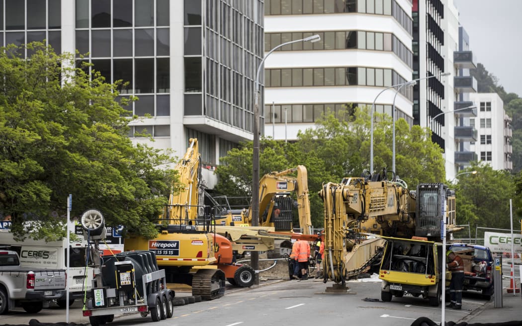 Construction vehicles at work on demolishing 61 Molesworth Street in central Wellington after it was damaged in the Kaikōura earthquake.
