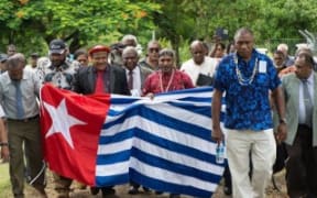 The United Liberation Movement for West Papua converges on the Melanesian Spearhead Group secretariat to submit its formal membership application.