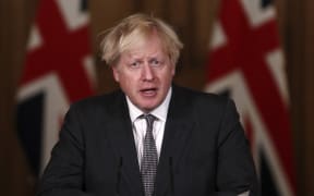 Britain's Prime Minister Boris Johnson speaks during a virtual press conference inside 10 Downing Street in central London on December 30, 2020.