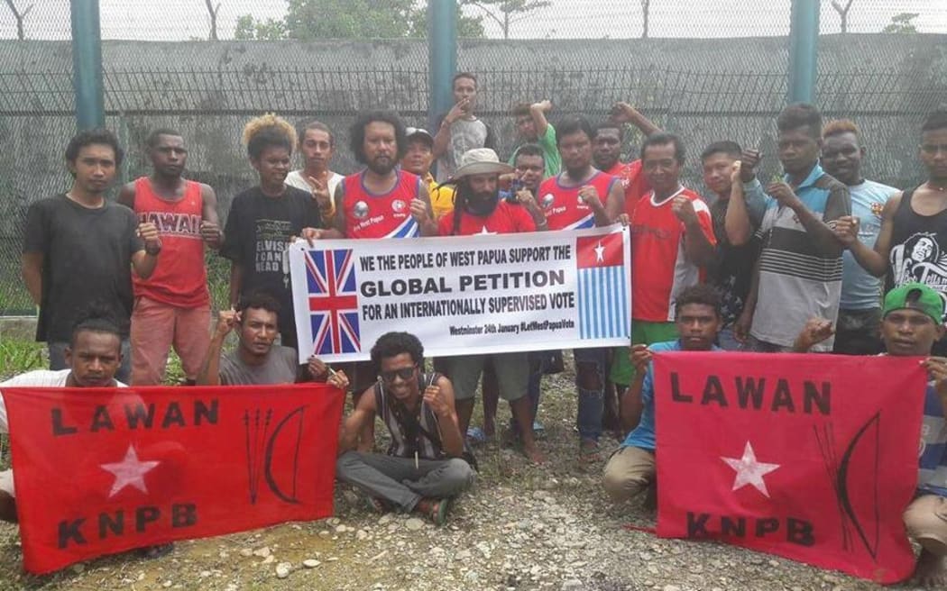 West Papuan people showing their support from inside the prison in Timika for the Global Petition for West Papua.