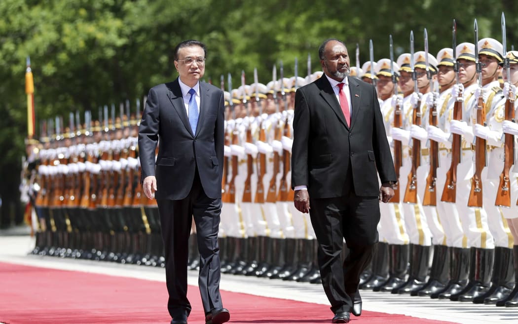 Vanuatu prime minister Charlot Salwai meets with Chinese Premier Li Keqiang ahead of talks in Beijing.
