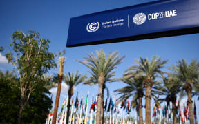 COP28 logo is seen on the opening day of the United Nations Climate Change Conference COP28 in Dubai, United Arab Emirates on November 30, 2023. (Photo by Jakub Porzycki/NurPhoto) (Photo by Jakub Porzycki / NurPhoto / NurPhoto via AFP)