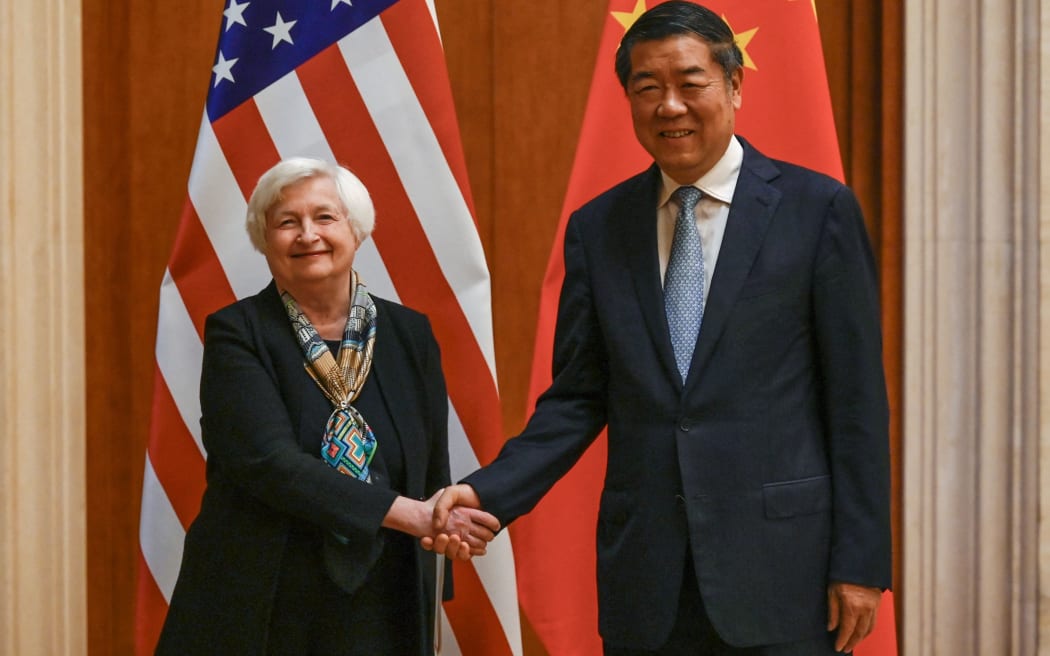 US Treasury Secretary Janet Yellen (L) shakes hands with Chinese Vice Premier He Lifeng during a meeting at the Diaoyutai State Guesthouse in Beijing on July 8, 2023. (Photo by Pedro PARDO and Pedro Pardo / POOL / AFP)