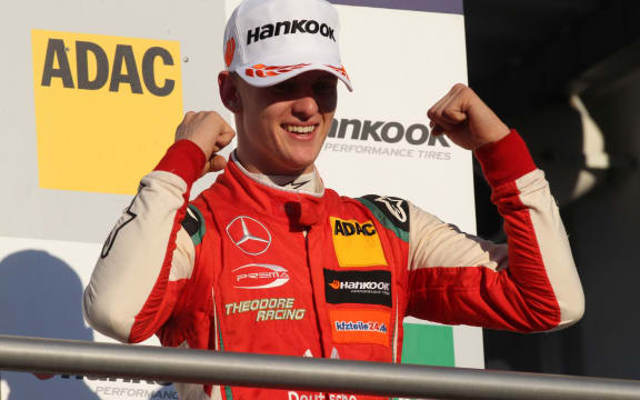 Mick Schumacher celebrates winning the 2018 Formula Three European championship.