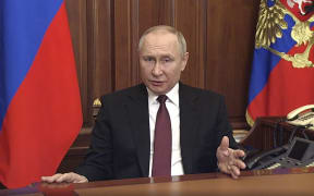 Russian President Vladimir Putin addresses the nation at the Kremlin in Moscow, announcing the military operation against Ukraine.