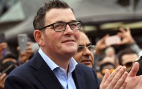 Daniel Andrews claims historic third term for Labor in Victorian election
