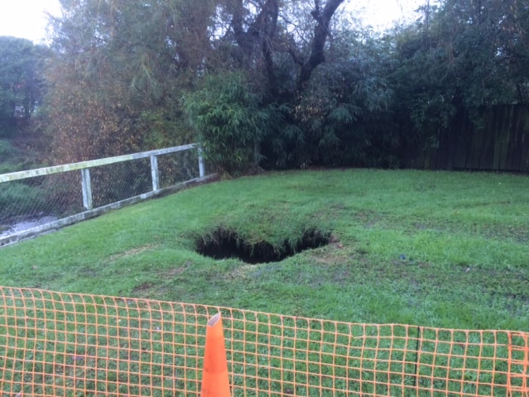 A large sink hole which opened up in Matatua Road, Raumati.
