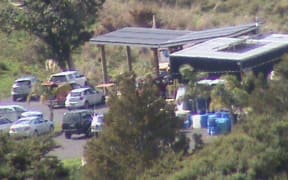 Photographs taken by neighbours of what appeared to be shooting events held at Auckland shooting club, which has been ordered to cease operating.