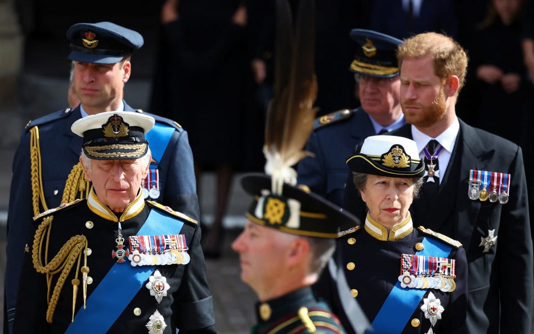 Britain's King Charles III, Princess Anne, Princess Royal, Prince William, Prince of Wales and Prince Harry, Duke of Sussex stand outside Westminster Abbey after the state funeral in London on September 19, 2022.