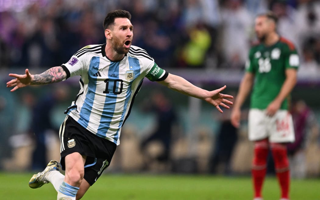 Argentina's forward #10 Lionel Messi celebrates scoring the opening goal during the Qatar 2022 World Cup Group C football match between Argentina and Mexico at the Lusail Stadium in Lusail, north of Doha on November 26, 2022. (Photo by Kirill KUDRYAVTSEV / AFP)