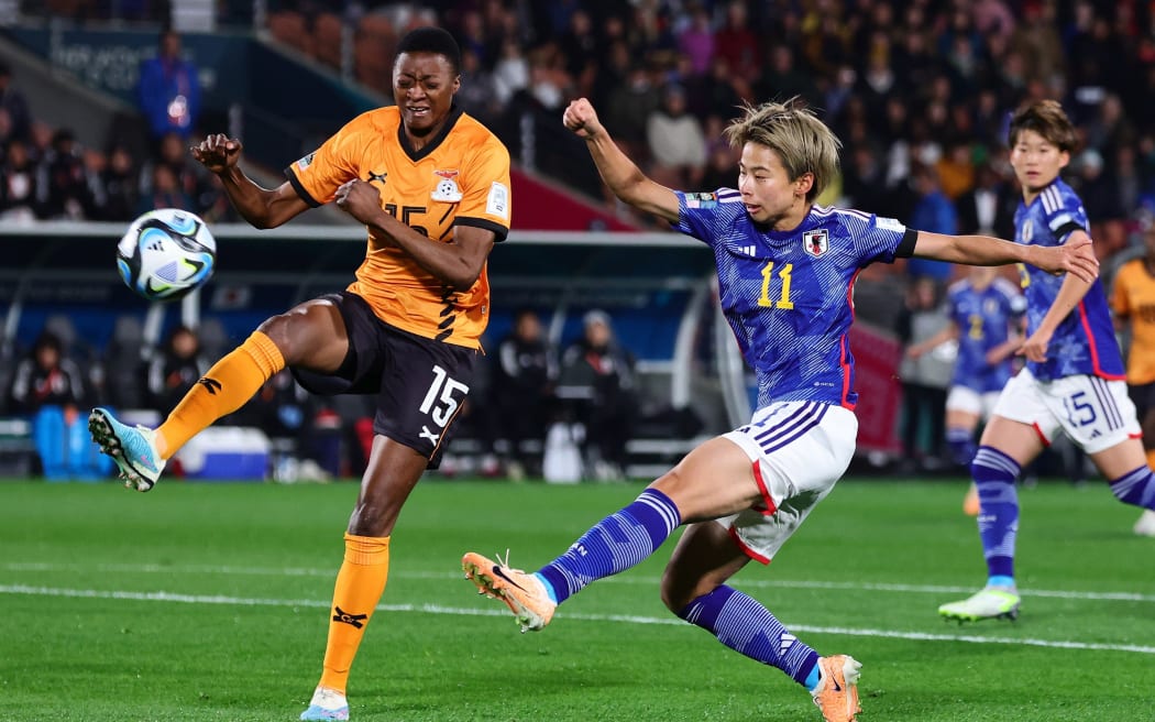 Mina Tanaka of Japan shoots at goal during their FIFA Women's World Cup group match between Zambia.